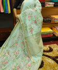 Pastel Green Silk Linen Saree with Floral Embroidery